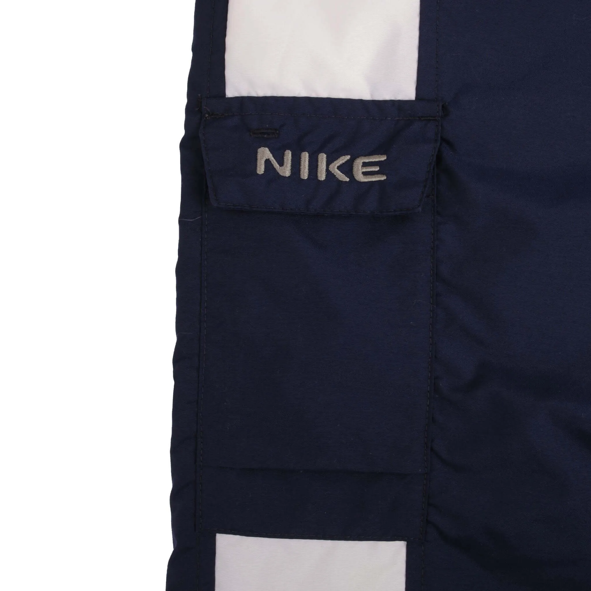 VINTAGE NIKE WHITE AND BLUE NYLON TRACK PANTS 2000S SIZE LARGE